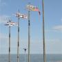 De voor de Koerse Schoorwal unieke en mooi gedecoreerde windvanen