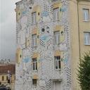 Street-art in Vilnius, gebouw beschilderd door de Italiaanse kunstenaar Millo